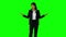 Businesswoman wearing something with her hands on green screen