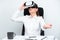 Businesswoman Wearing Virtual Reality Headset And Gesturing While Learning Professional Skill Through Simulation. Woman