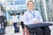 Businesswoman in a wheelchair on arrival to the congress