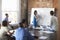 Businesswoman At Whiteboard In Brainstorming Meeting