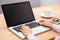 Businesswoman working with notebook laptop computer, using finger with keyboard for typing. computer laptop with black screen