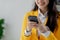 Businesswoman is working in the office and talking on the phone with a partner, Entrepreneurs use smartphones to find information