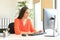 Businesswoman working typing in a desktop computer