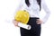 Businesswoman yellow hat and plan