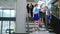 Businesswomen discussing on document while standing on stairs