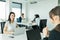 Businesswomen exchanging thoughts in a nice office environment