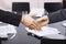 Businesswomen handshake over table