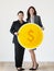 Businesswomen holding dollar coin icon