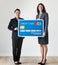 Businesswomen standing together with credit card icon