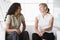 Businesswomen talking in lobby