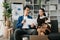 Businesswomen work and discuss their business plans. A Human employee explains and shows her colleague the results paper in modern