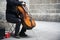 Busker playing the cello