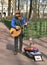 Busker with puppets.