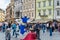 Buskers at the Old town sqare performing acrobatics  to attract  crowd`s attention  in the Prague City, Czech
