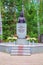 Bust of Empress Alexandra Feodorovna in the monastery in honor of the holy royal martyrs `Ganina Yama` on a summer sunny day