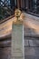 Bust of Gustave Eiffel in front of the Eiffel Tower in Paris, France.