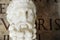 Bust of imperator Commodus in the Capitoline Museum in Rome. On the background ancient latin inscription.