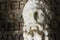 Bust of imperator Commodus in the Capitoline Museum in Rome. On the background ancient latin inscription.