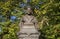 Bust of Mikael Agricola in the background of autumn foliage. Vyborg