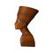 Bust or statue of the ancient Egyptian queen Nefertiti made of brown stone on a white background. Isolate. The symbol of eternal