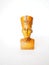 Bust or statue of the ancient Egyptian queen Nefertiti made of brown stone on a white background. The symbol of eternal female