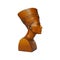 Bust or statue of the ancient Egyptian queen Nefertiti made of brown stone on a white background. The symbol of eternal female