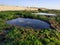 Bustan HaGalil sandy beach with rocks near Acre Haifa Israel. Akko seashore Mediterranean sea. Clear water stones