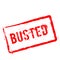 Busted red rubber stamp isolated on white.