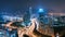 Bustling city at night with illuminated streets and skyscrapers