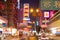 The bustling commercial district of Nathan Road with neon signs at Hong Kong