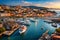 A bustling harbor with a variety of boats and ships docked,