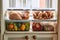bustling kitchen filled with array of food items stored in various plastic containers. sense of organization