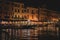 Bustling night view of the Grand Canal in Venice