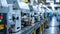 The bustling production floor of a stateoftheart manufacturing facility where rows of advanced CNC machines hum with