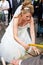 Busty bride sawing low with saw