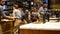 Busy baristas serving customers at the first Starbucks opening in Milan, Italy