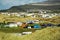 Busy caravan park with many tents, motor homes and caravans, Warm sunny day.