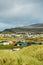 Busy caravan park with many tents, motor homes and caravans, Warm sunny day.