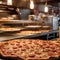 Busy Chef Preparing Delicious Pizza in an Italian Restaurant