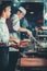 Busy chefs at work in the restaurant kitchen