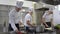 Busy cooks and kitchen chef working in professional kitchen