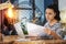 Busy employee looking at the documents while working at home