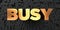 Busy - Gold text on black background - 3D rendered royalty free stock picture