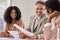 Busy happy smiling senior business man having conversation at office meeting.