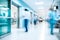 A busy hospital corridor with doctors and nurses walking. Long exposure motion blur