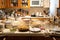 busy kitchen, with plates, glasses, and food waiting to be served at the holiday dinner table