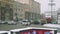 Busy large avenue in Moscow with cars rushing here and there during hard snowfall