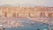 Busy Marseille bay with sail boats docked, many tourists in city, time-lapse