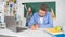 busy school teacher in classroom with selective focus of kid making selfie at blackboard