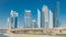 Busy Sheikh Zayed Road , metro railway and modern skyscrapers around in luxury Dubai city
